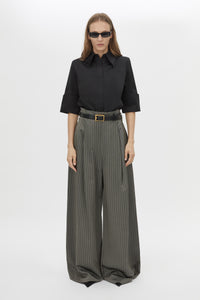 Front styled view CAMILLA AND MARC Mina Pant in Steel Grey Stripe with a high‑waisted wide‑leg silhouette and corseted waist.