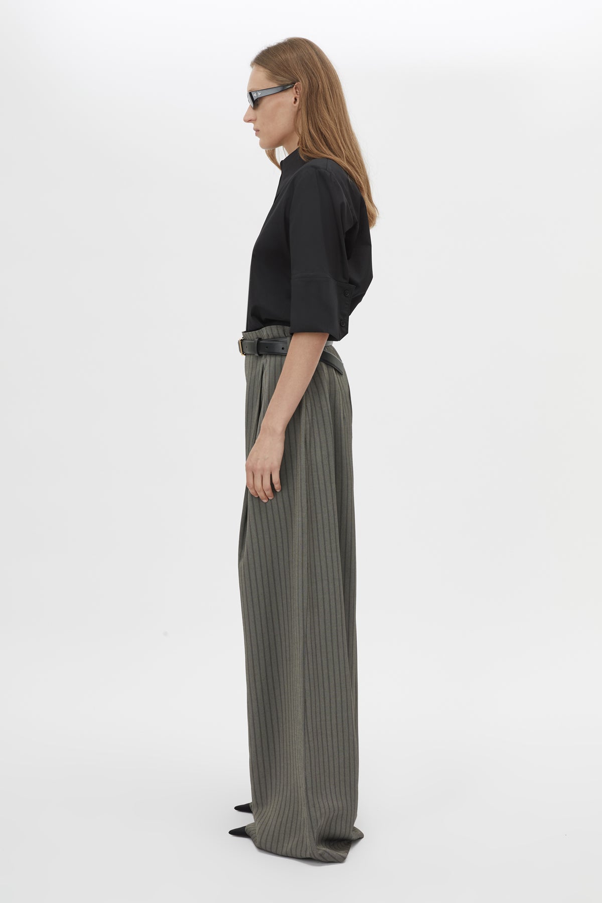 Side view CAMILLA AND MARC Mina Pant in Steel Grey Stripe with a high‑waisted wide‑leg silhouette and corseted waist.