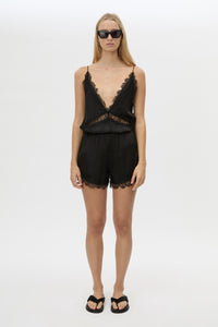 Front styled view CAMILLA AND MARC Mirage Lace Trim Short in Black, featuring a satin fabrication, and elastic waistband.