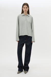 Front view CAMILLA AND MARC Moreno Long Sleeve Polo Top in Grey Marle with quarter button placket, and embroidered monogram.