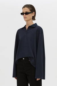 Cropped view CAMILLA AND MARC cotton Moreno Long Sleeve Polo Top in navy with quarter external button placket.