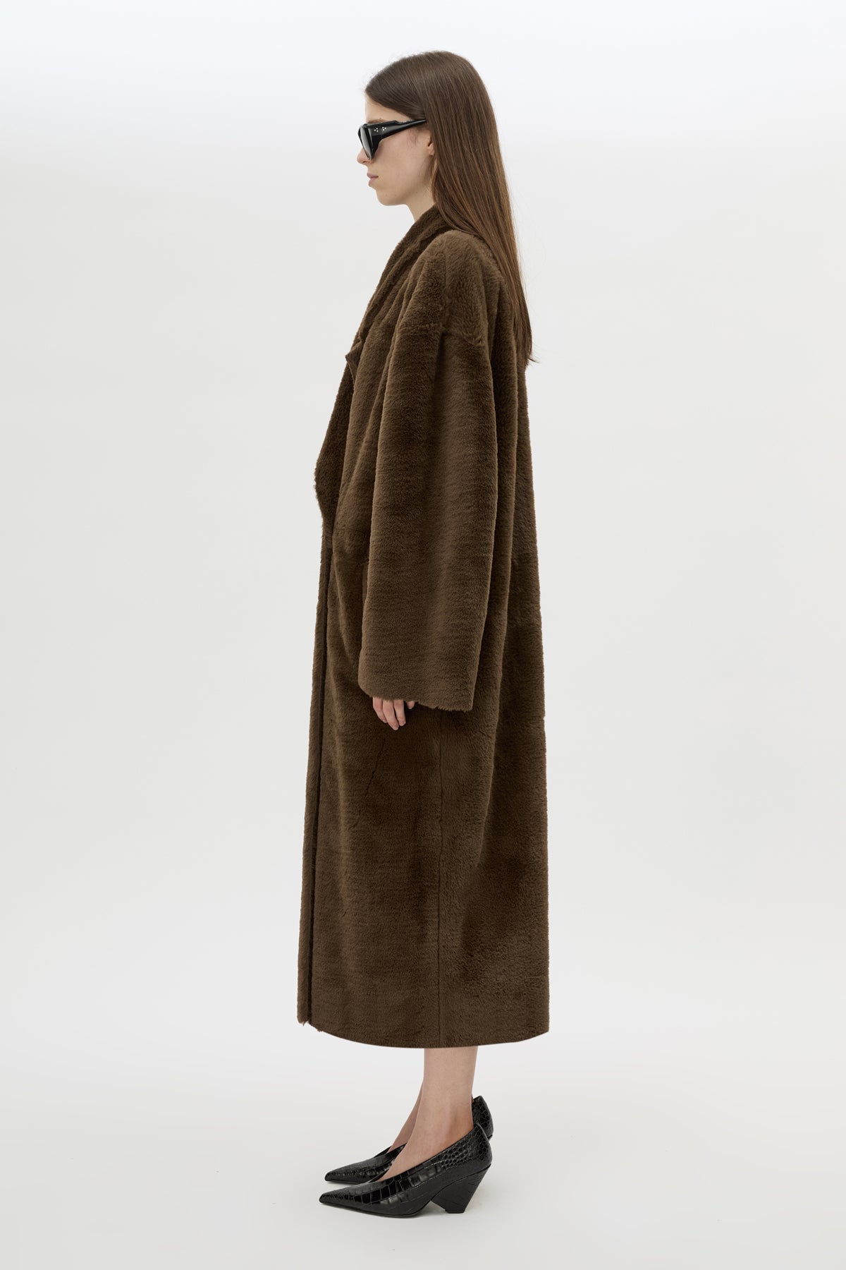 Side view CAMILLA AND MARC Nala Furry Coat in Truffle styled with the Rhys Croc Pump.