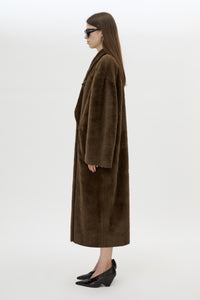 Side view CAMILLA AND MARC Nala Furry Coat in Truffle styled with the Rhys Croc Pump.