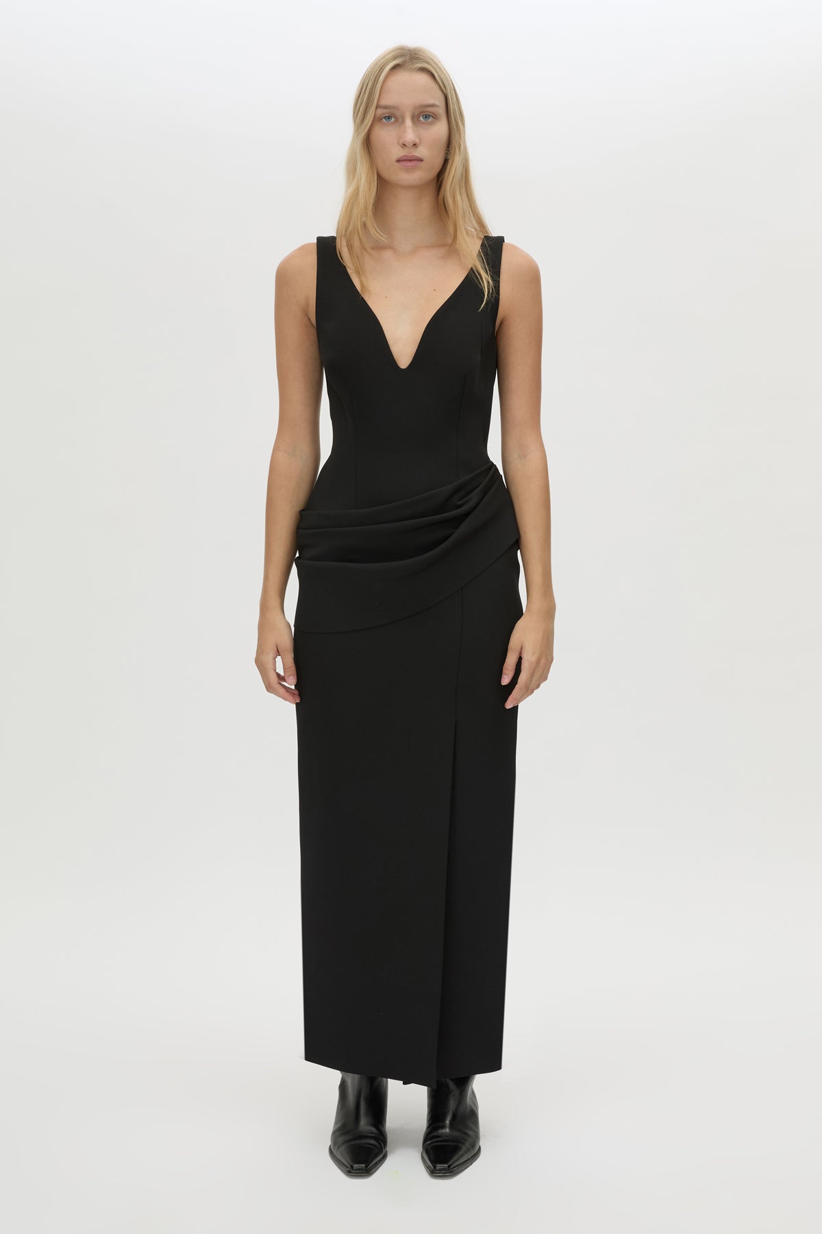 Front view CAMILLA AND MARC Namira Midi Dress in black with draped hip panel and a plunging neckline.