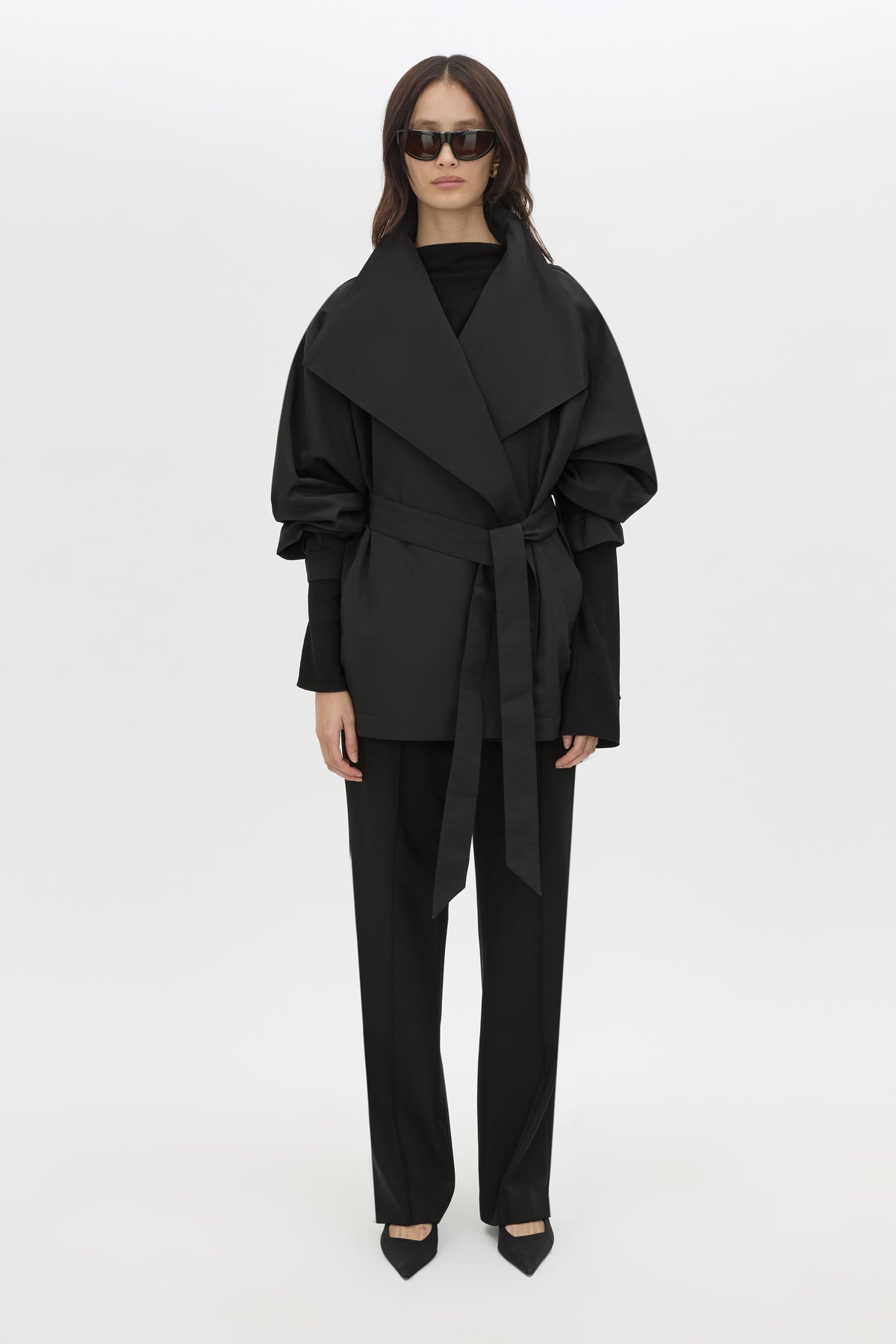 Front styled view CAMILLA AND MARC Nasir Cropped Jacket in Black with high‑neck, double‑breasted wrap design.
