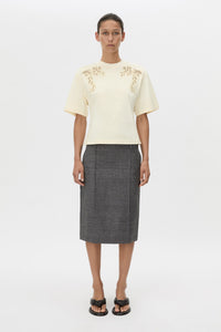 Front view CAMILLA AND MARC Niami Crochet Tee in cream with crochet detailing at the shoulder.