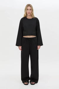 Front view CAMILLA AND MARC Niami Jersey Pant in black with a relaxed straight‑leg fit.