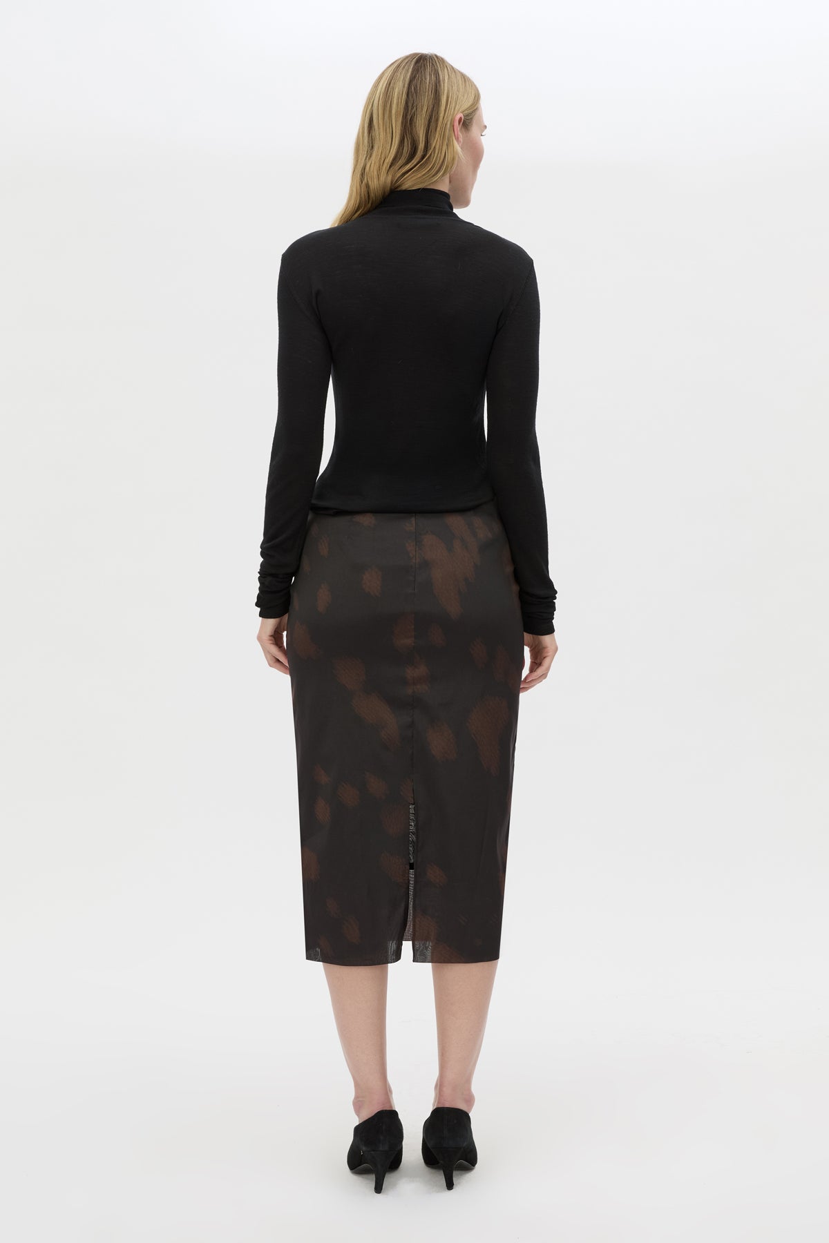 Back view CAMILLA AND MARC Nieve Sheer Printed Midi Skirt in Black Chocolate print with silk stretch fabrication.