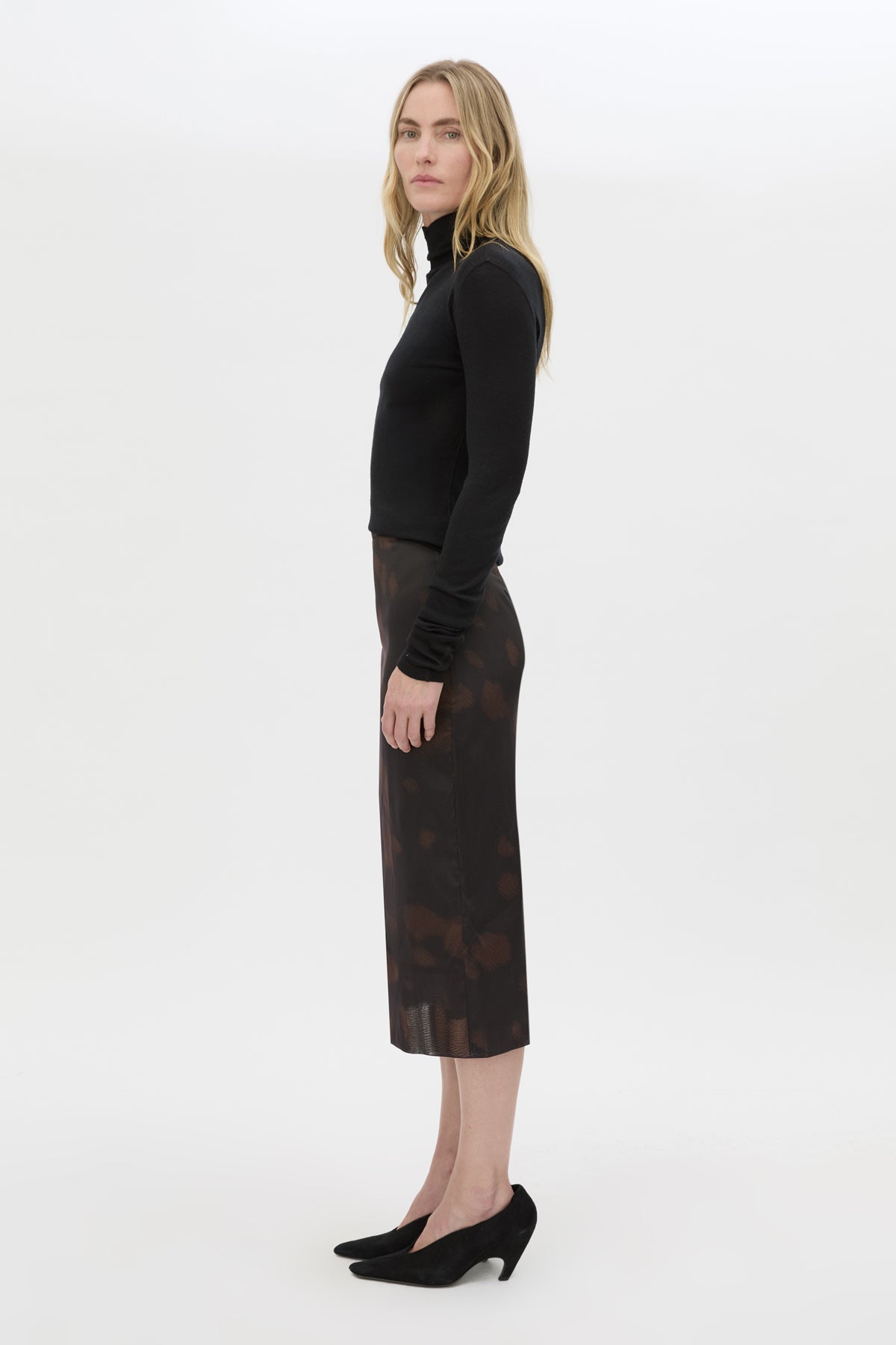 Side view CAMILLA AND MARC Nieve Sheer Printed Midi Skirt in Black Chocolate print with silk stretch fabrication.