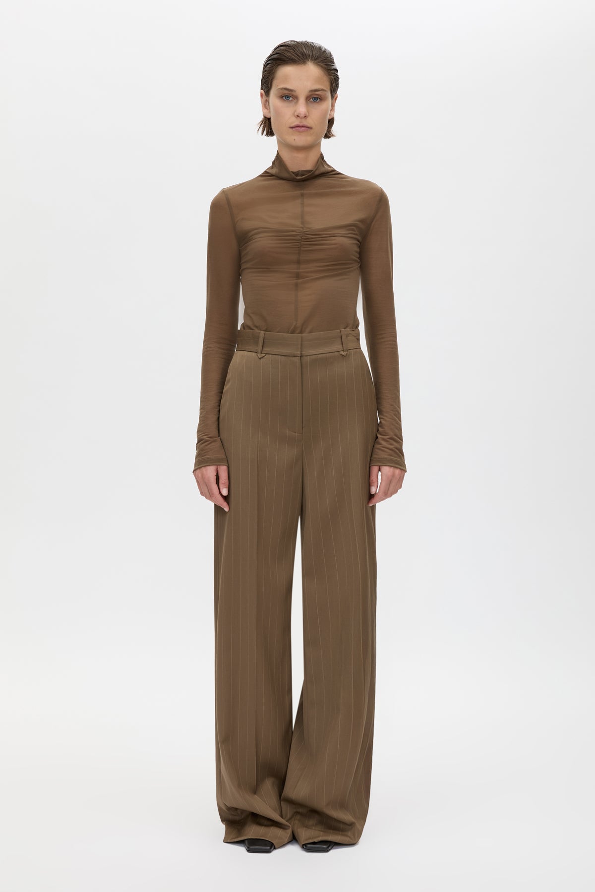 Front styled view CAMILLA AND MARC Novel Long Sleeve Stocking Top in Khaki with ruched bust detail.
