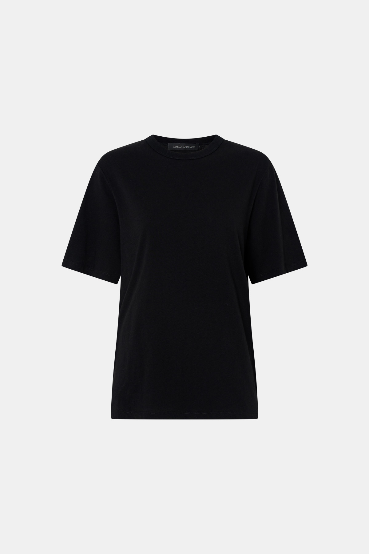 Ghost view CAMILLA AND MARC relaxed Olympia Print Tee in black with white plastisol artwork at centre back.