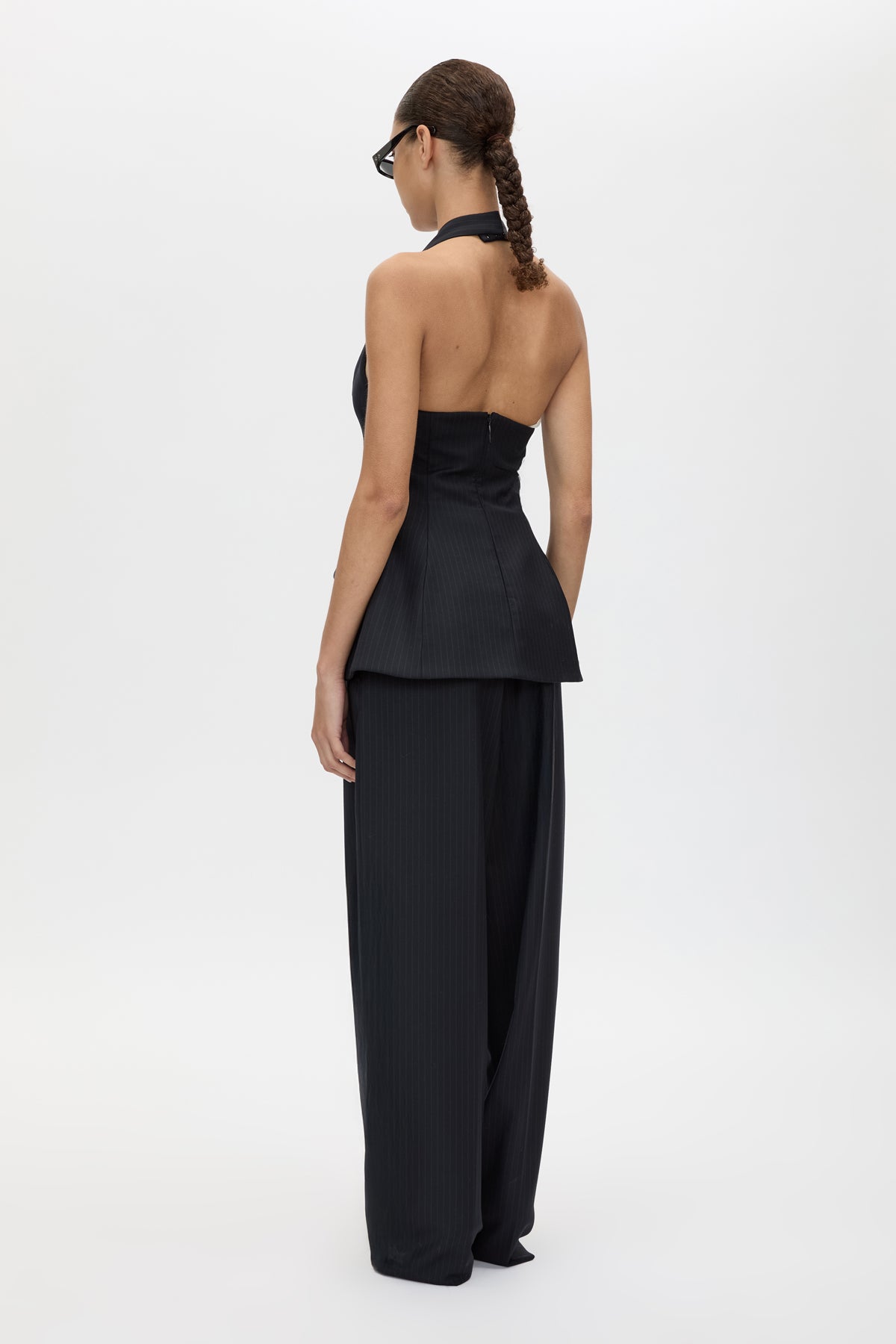 Back view CAMILLA AND MARC Orban Tailored Halter Top in Navy Pinstripe with deep V‑neck, fitted waist and open back.