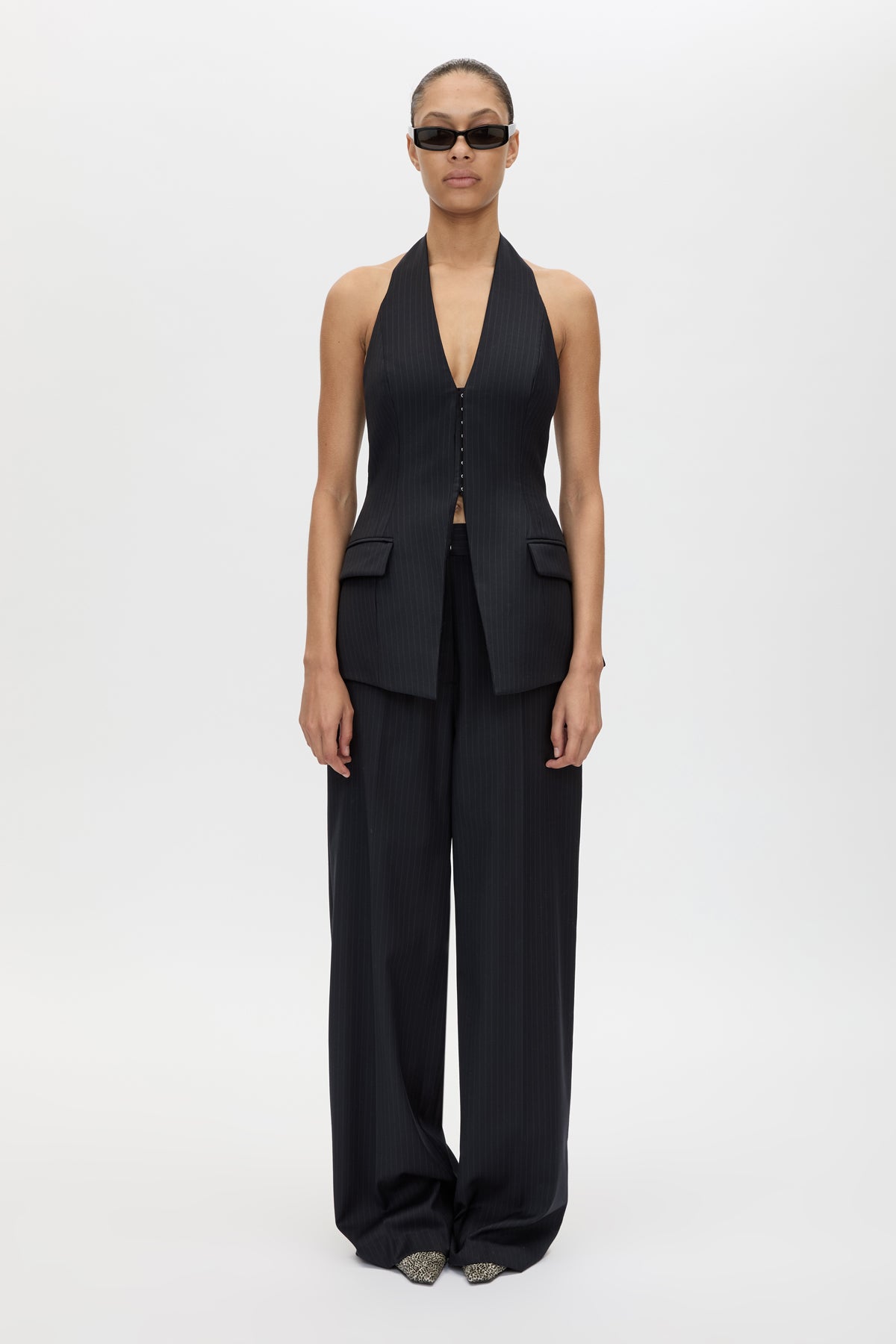 Front styled view CAMILLA AND MARC Orban Wide Leg Pant in Navy Pinstripe with tailored wide legs.