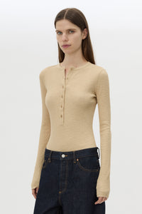Cropped view CAMILLA AND MARC Orion Slub Jersey Bodysuit in Camel with long sleeves, rib button placket.