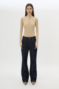Front styled view CAMILLA AND MARC Orion Slub Jersey Bodysuit in Camel with long sleeves, and rib button placket.
