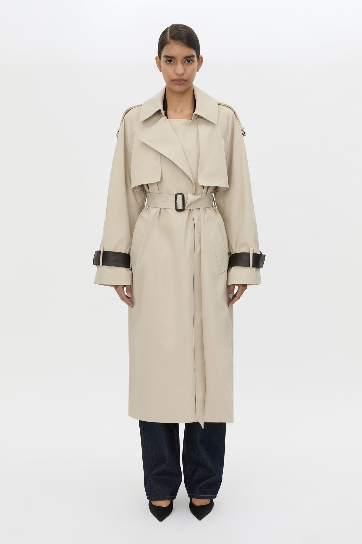 Front styled view CAMILLA AND MARC Passage Volumous Trench in Stone with detachable contrast leather collar and waistbelt.