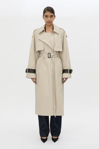 Front styled view CAMILLA AND MARC Passage Volumous Trench in Stone with detachable contrast leather collar and waistbelt.