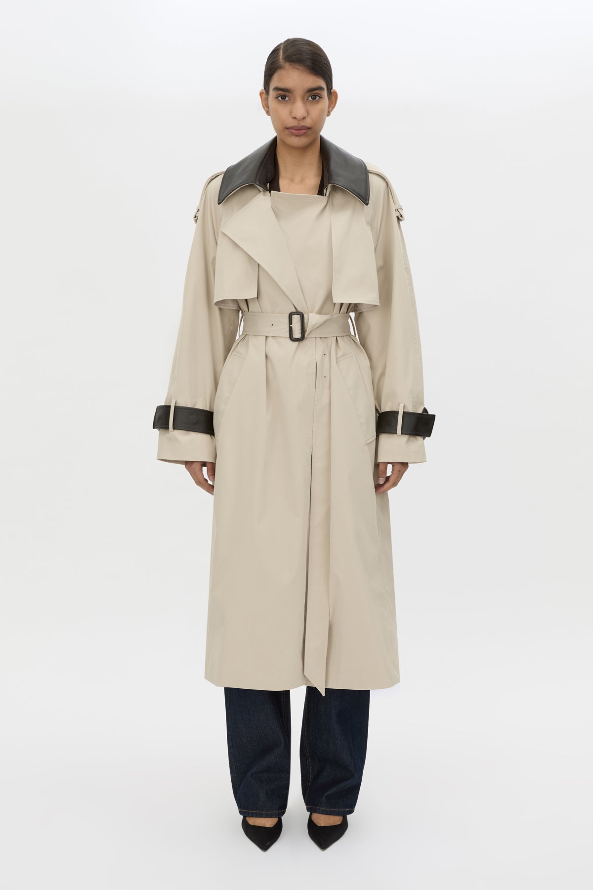 Front view CAMILLA AND MARC Passage Volumous Trench in Stone with detachable contrast leather collar styled down.