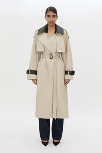 Front view CAMILLA AND MARC Passage Volumous Trench in Stone with detachable contrast leather collar styled down.
