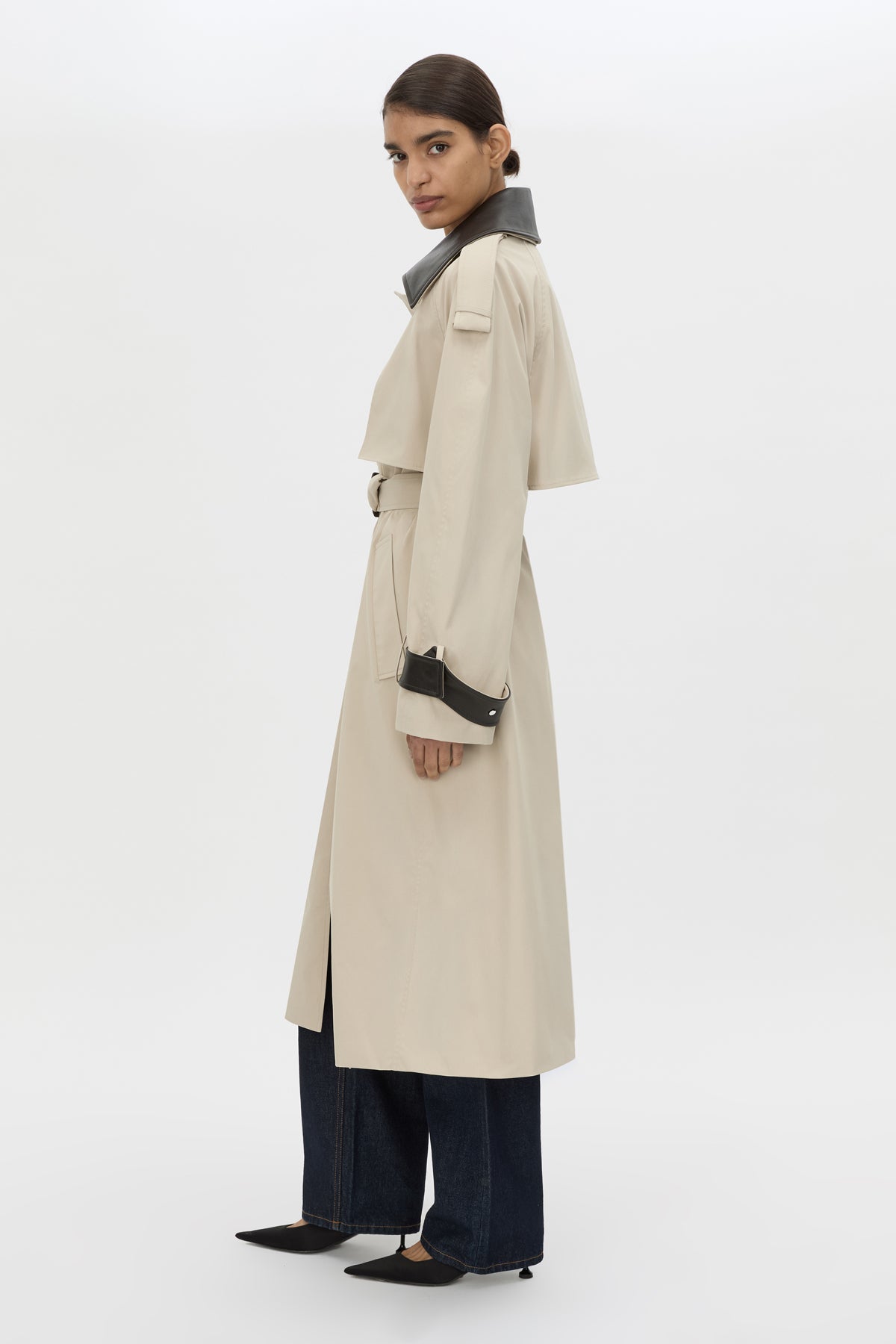Side view CAMILLA AND MARC Passage Volumous Trench in Stone with detachable contrast leather collar.