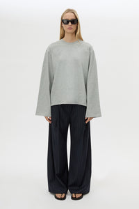 Front view CAMILLA AND MARC Peretti Long Sleeve Tee in Grey Marle styled with the Brody Pant.