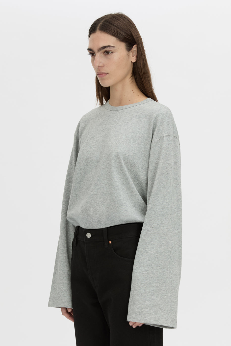 Cropped view CAMILLA AND MARC relaxed Peretti Long Sleeve Tee in grey marle with straddle-stitch seams.
