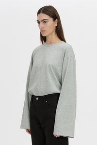 Cropped view CAMILLA AND MARC relaxed Peretti Long Sleeve Tee in grey marle with straddle-stitch seams.
