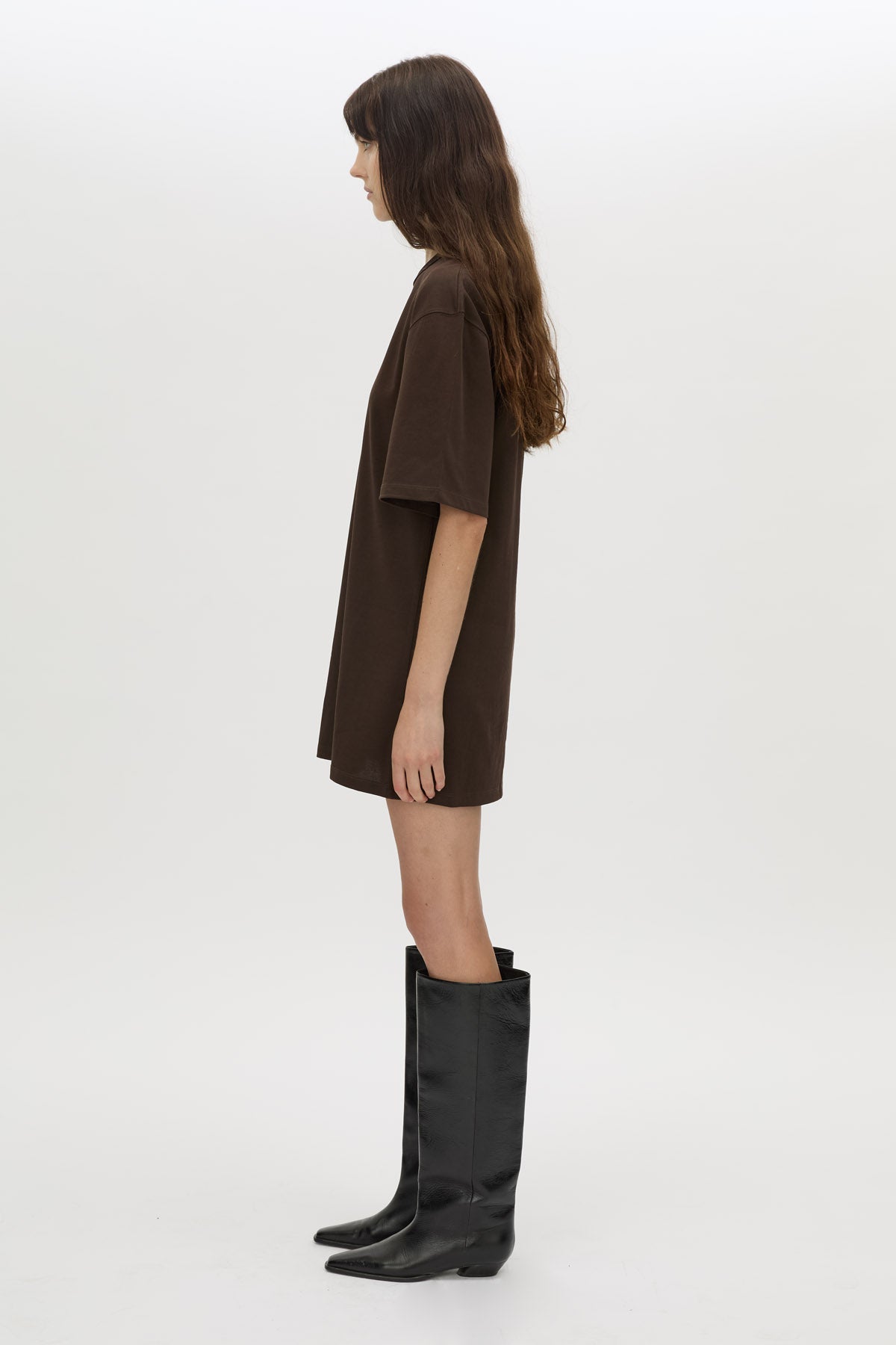 Side view CAMILLA AND MARC Peretti Mini Tee Dress in Espresso Brown with rolled short sleeves and mini tee silhouette.