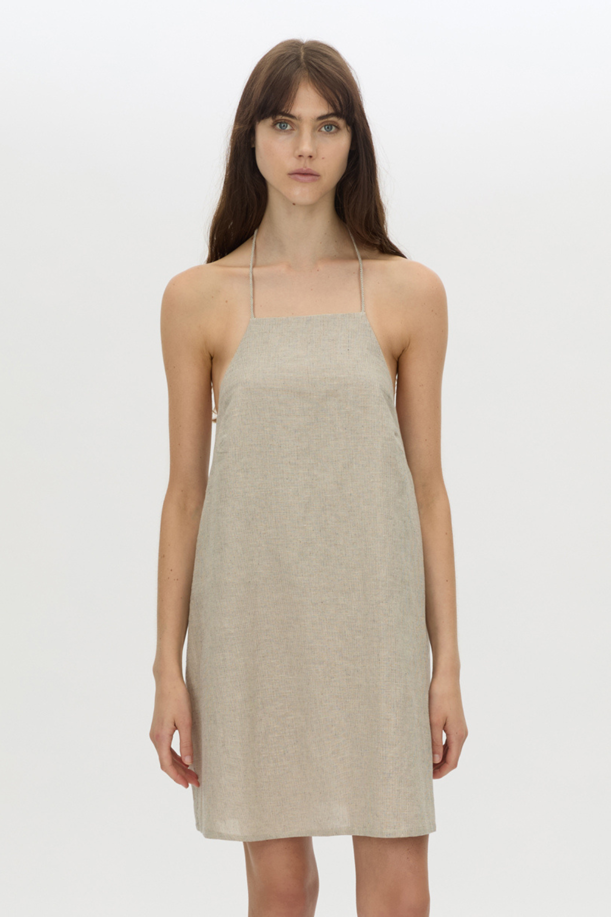 Cropped view CAMILLA AND MARC Phostre Halter Mini Dress in sand with a halter neckline.