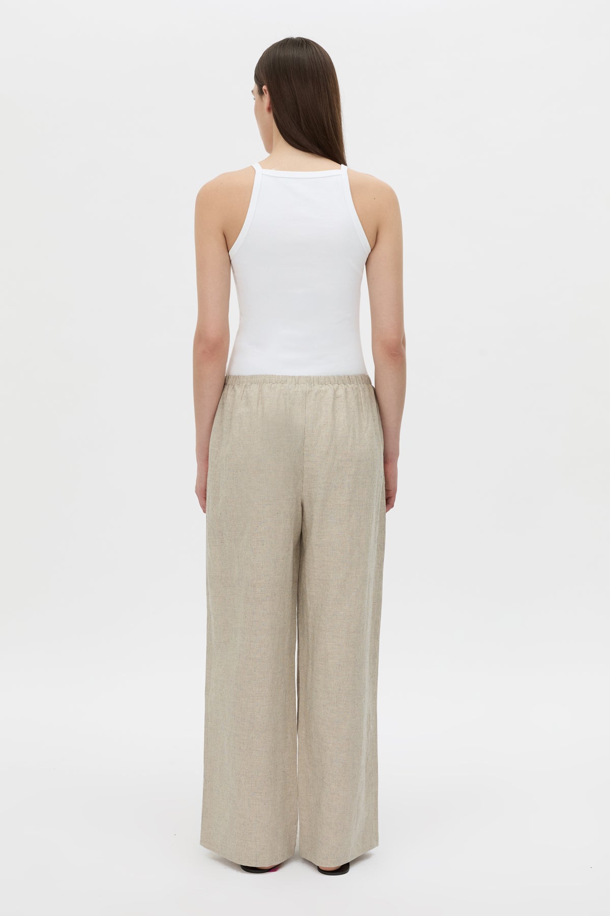 Back view CAMILLA AND MARC wide-leg Phostre Relaxed Pant in sand with a mid‑rise fit.