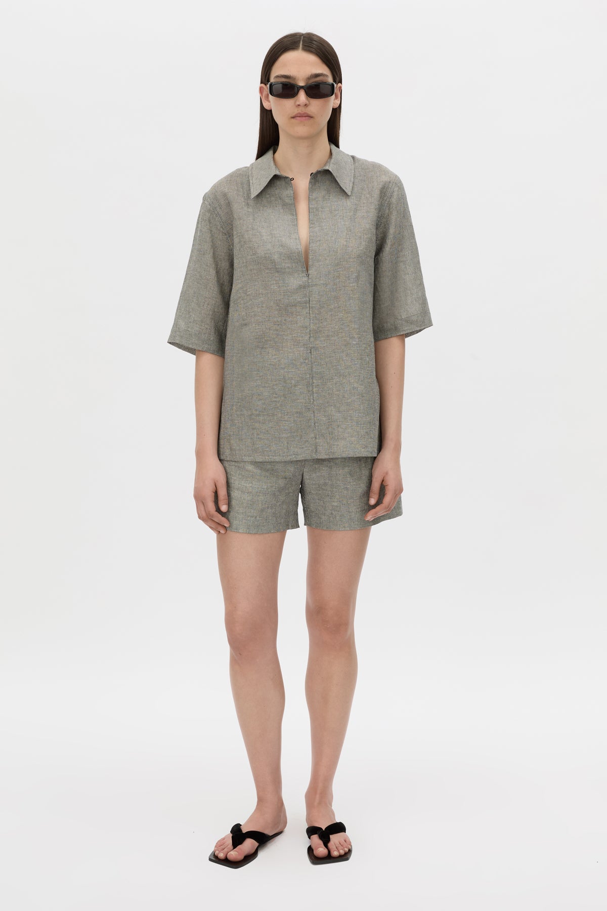 Styled view CAMILLA AND MARC mid-rise Phostre Tailored Mini Short in black and white stripe with a fixed waistband.