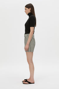 Side view CAMILLA AND MARC mid-rise Phostre Tailored Mini Short in black and white stripe with a fixed waistband.