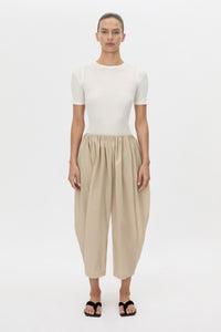 Front-styled view CAMILLA AND MARC Pietro Gathered Wide Leg Pant in stone with a voluminous leg.