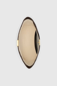 Top view CAMILLA AND MARC Poppy Eel Clutch in Burgundy eel‑embossed leather with ribbed gold hardware.