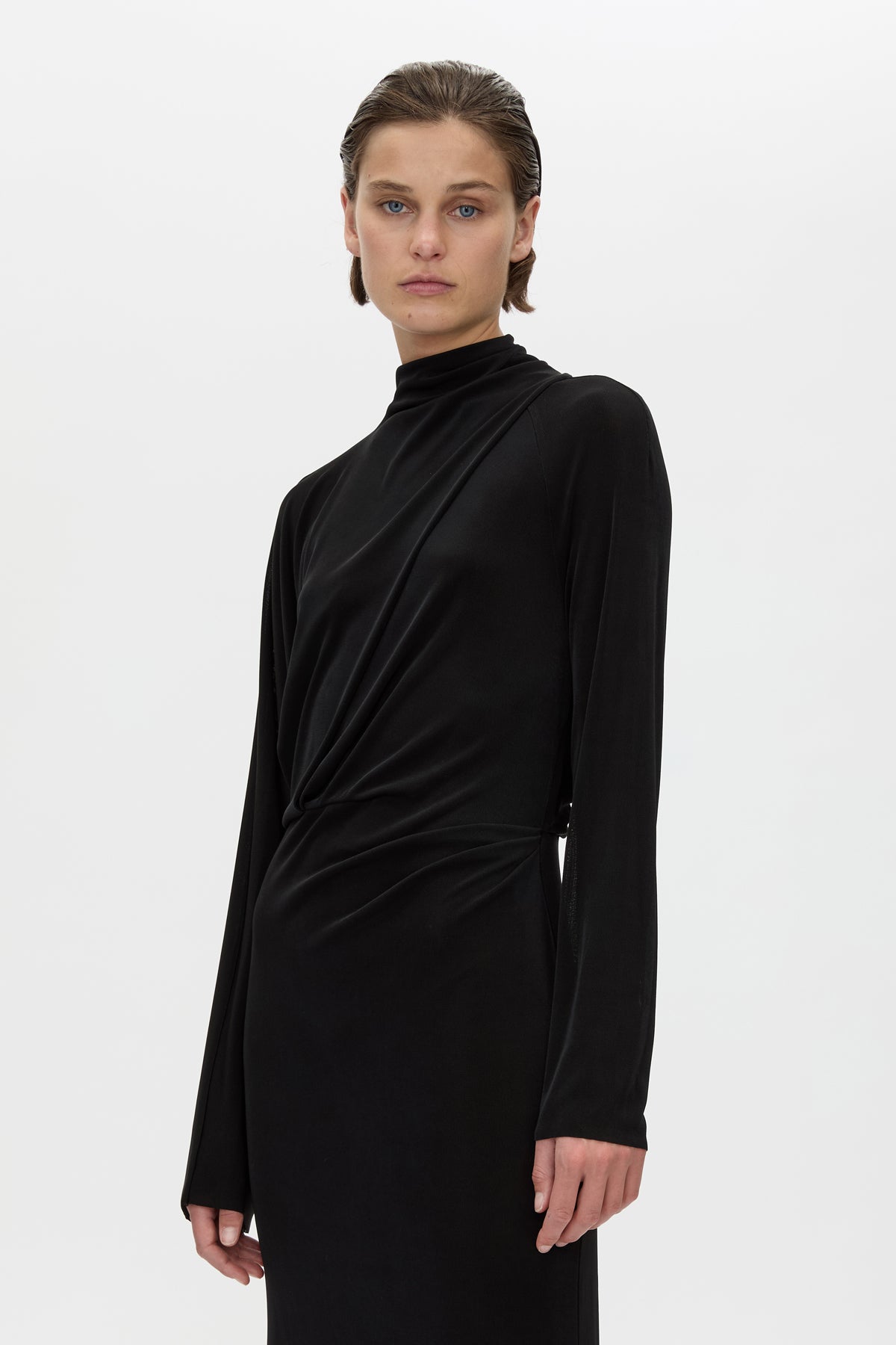 Cropped view CAMILLA AND MARC Ravine Midi Dress in Black with asymmetric draped neckline.