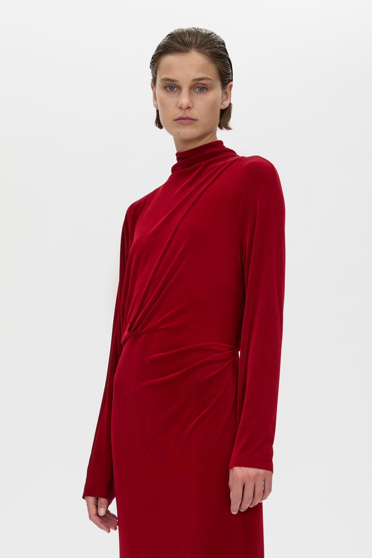 Cropped view CAMILLA AND MARC Ravine Midi Dress in Cherry Red with asymmetric draped neckline.
