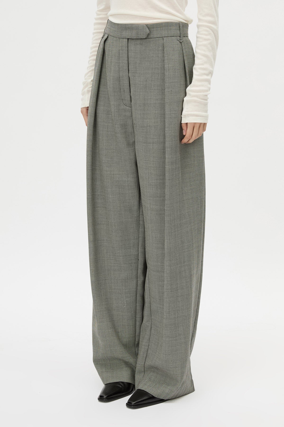 Cropped view CAMILLA AND MARC Ren Pant in Charcoal Herringbone with wide‑leg double pleats and tailored detailing.