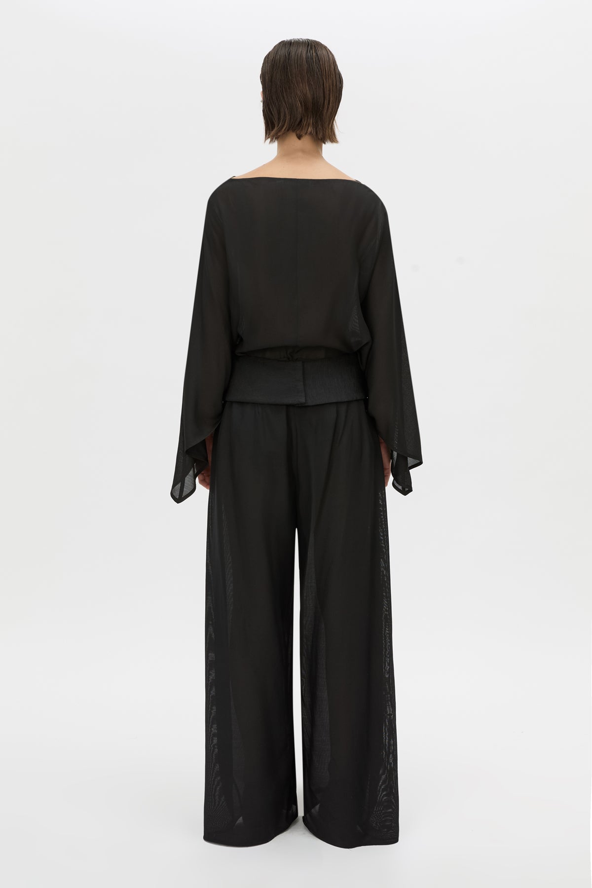 Back view CAMILLA AND MARC long-sleeve Rene Draped Top in black with a boat neckline.