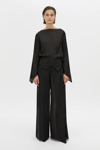Front-styled-2 view CAMILLA AND MARC long-sleeve Rene Draped Top in black with a boat neckline.