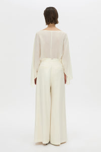 Back view CAMILLA AND MARC long-sleeve Rene Draped Top in cream with a boat neckline.