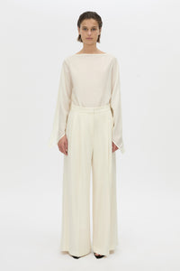 Front view CAMILLA AND MARC long-sleeve Rene Draped Top in cream with a boat neckline.