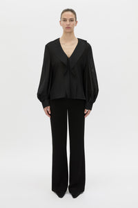Front view CAMILLA AND MARC Rene Long Sleeve Top in black with adjustable neckline and blouson sleeves.