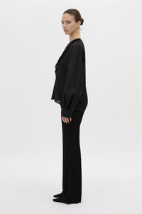 Side view CAMILLA AND MARC Rene Long Sleeve Top in black with adjustable neckline and blouson sleeves.