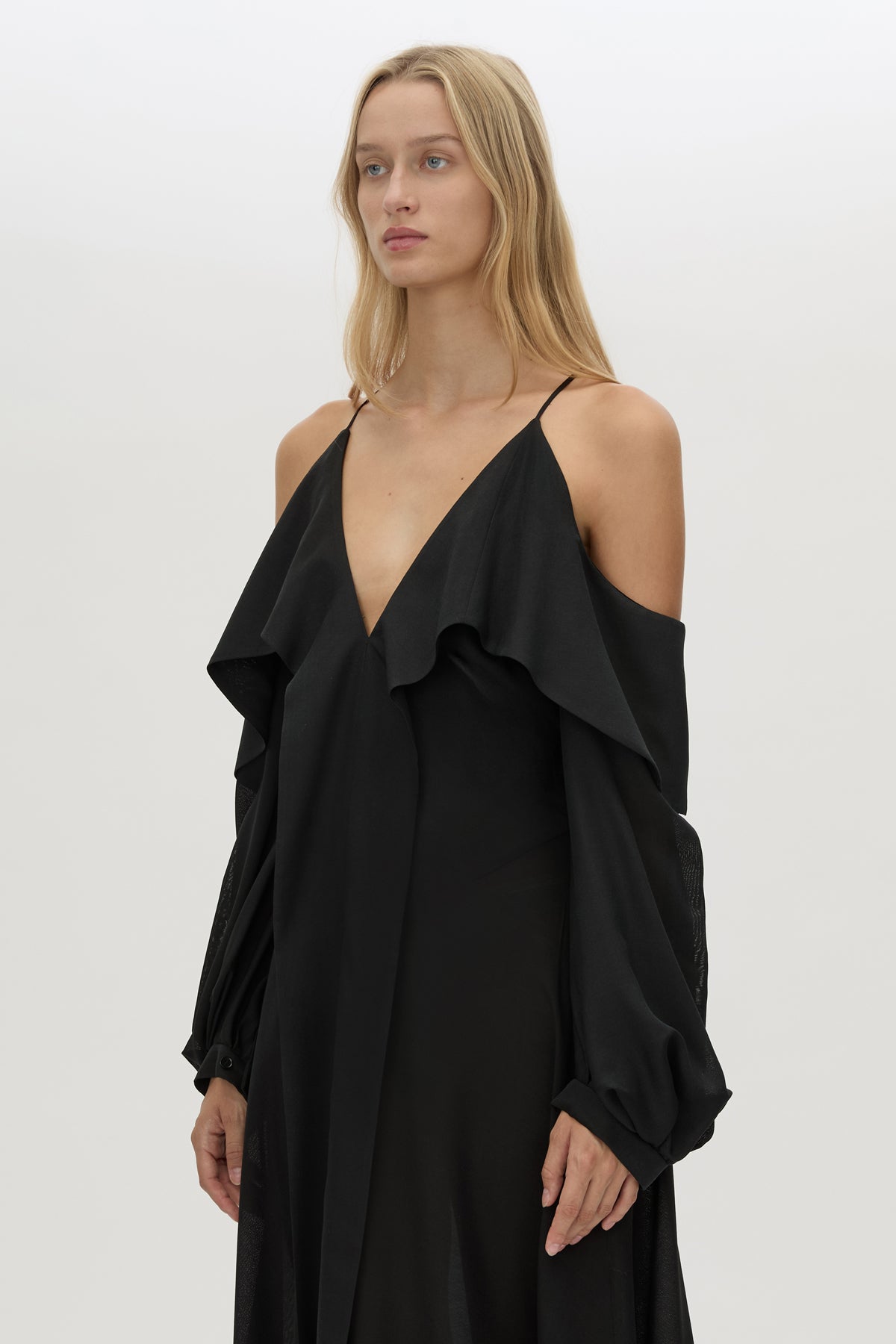 Cropped view CAMILLA AND MARC long-sleeve Rene Maxi Dress in black with exposed shoulder sleeves.