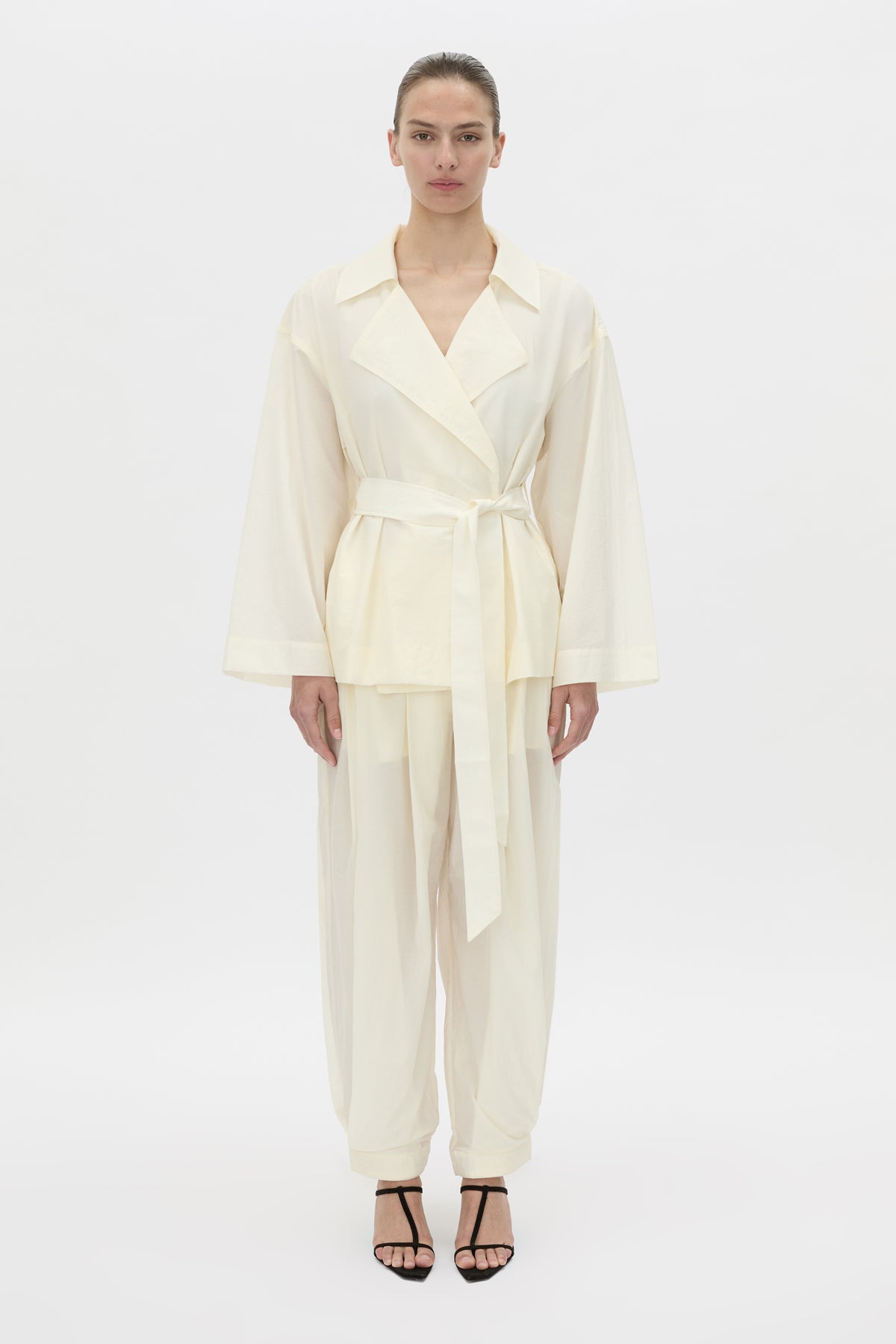 Front view CAMILLA AND MARC Rhia Sheer Cropped Trench in ivory white with a relaxed fit.