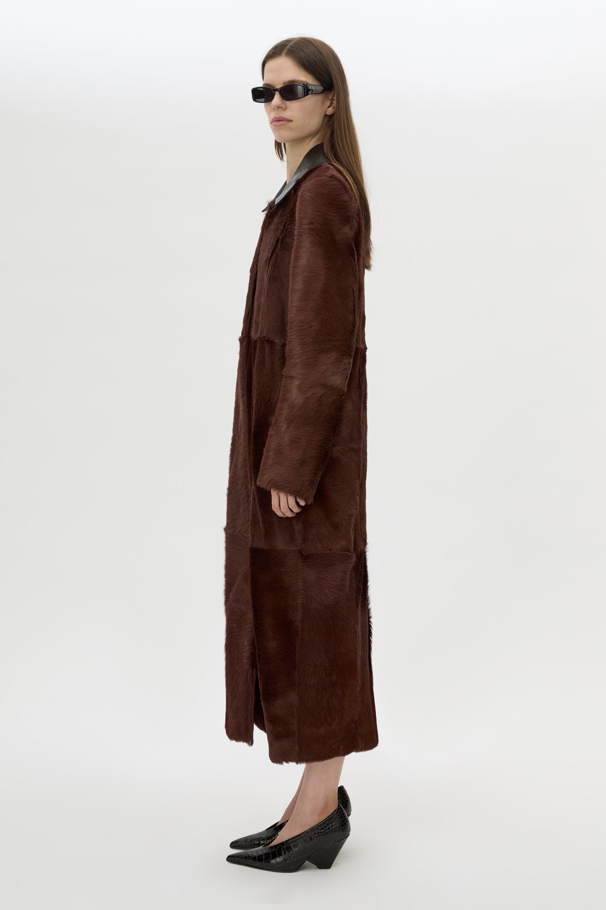Side view CAMILLA AND MARC Rina Coat in Chocolate Brown calf hair with contrast leather collar.