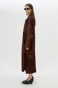Side view CAMILLA AND MARC Rina Coat in Chocolate Brown calf hair with contrast leather collar.