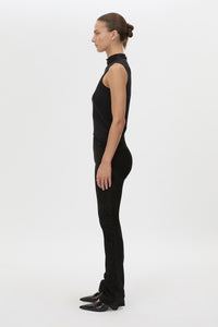 Side view CAMILLA AND MARC high-waisted Romina Pant in black stretch suede fabrication.