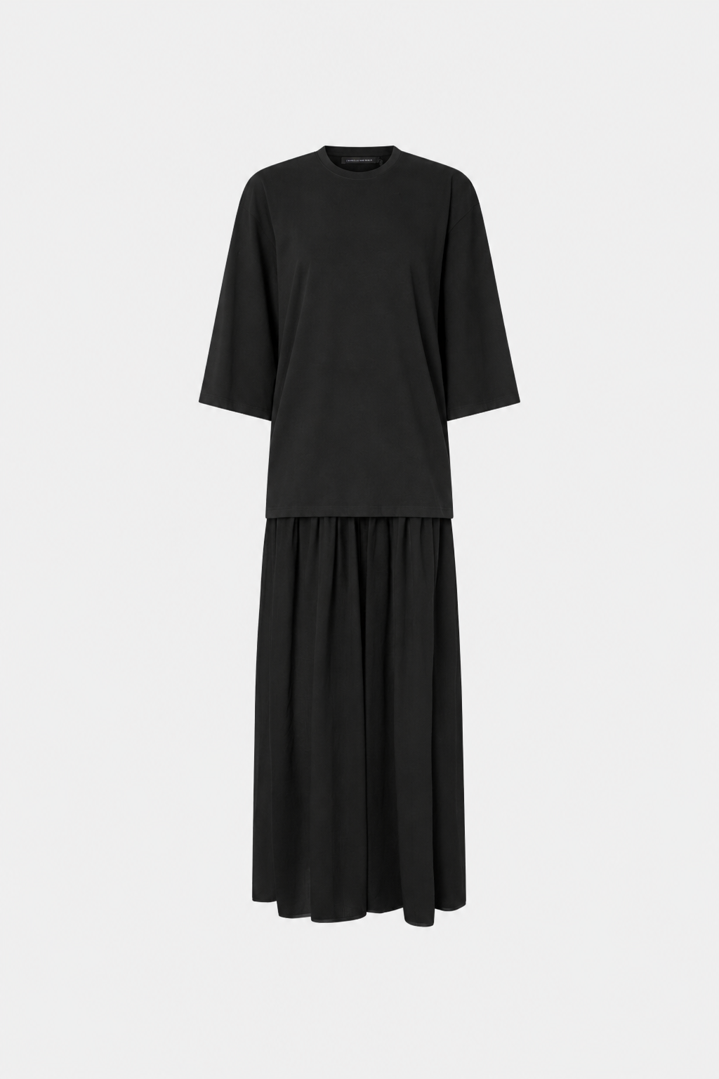 Ghost view CAMILLA AND MARC Romy Contrast Maxi Dress in black with upper cotton tee‑shirt and sheer voile extension.
