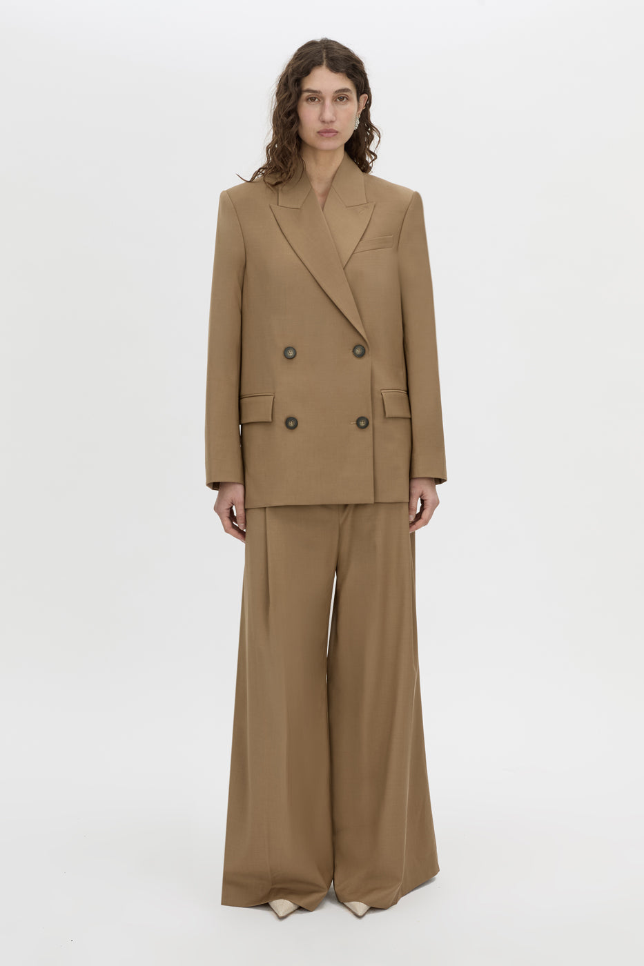Front-styled view CAMILLA AND MARC Rumi Double Breasted Blazer in camel with relaxed shoulder fit.
